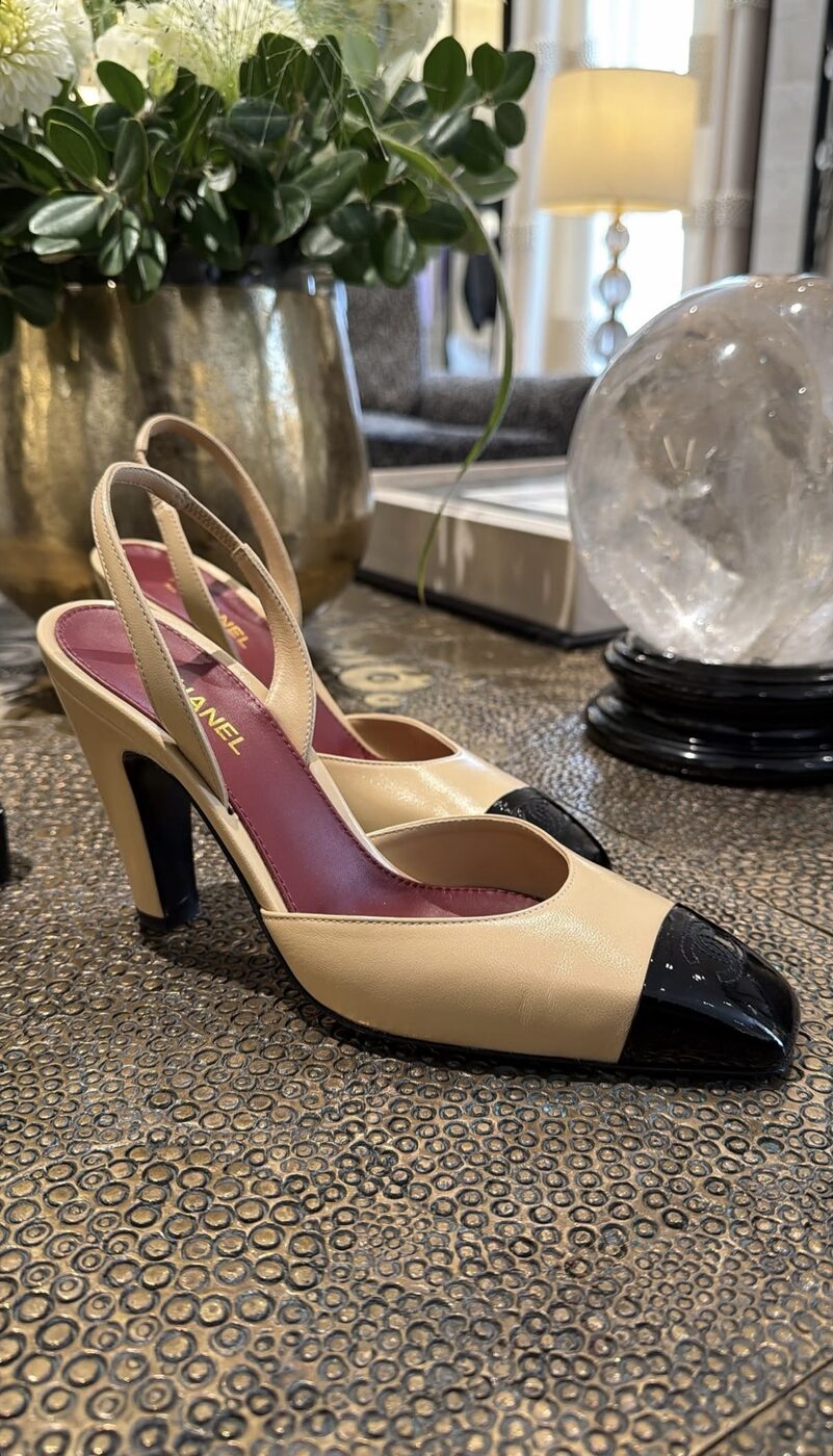 Close detail of the stitching and toe cap on an authentic Chanel slingback